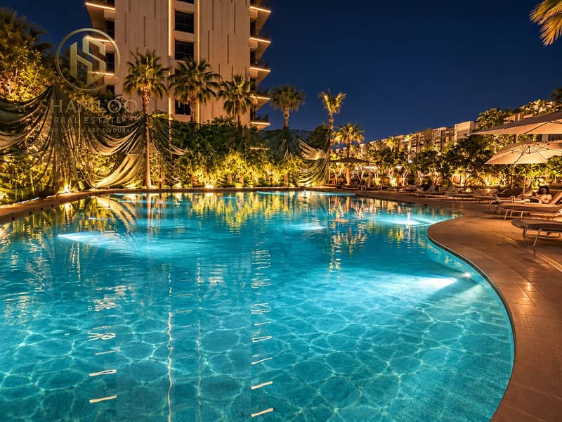 11 Luxury Nighttime Resort Pool. png
