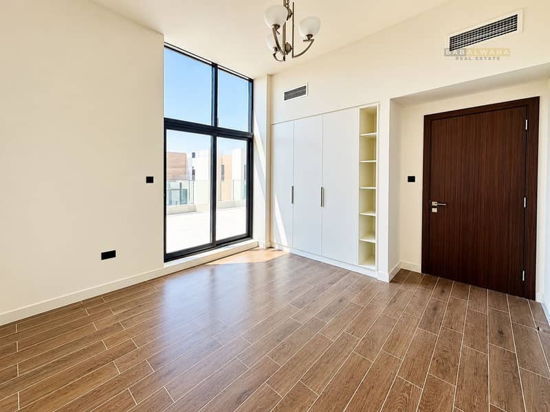 13 Bright Minimalist Room with City Window. png