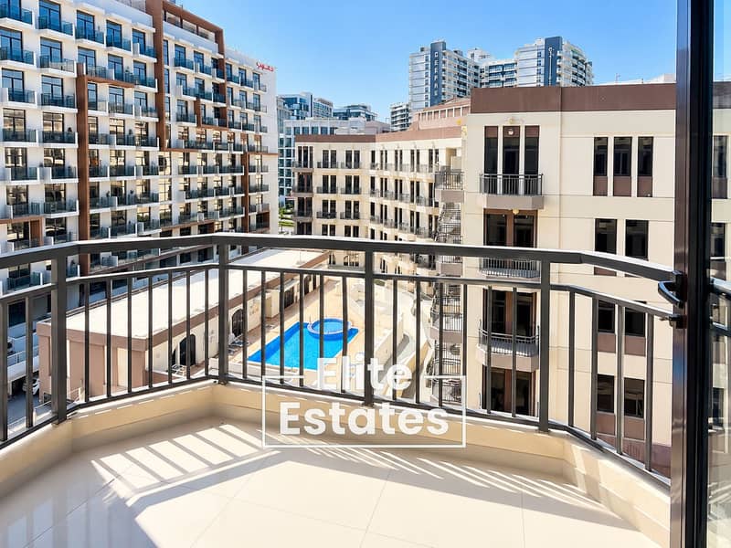 4 Sunny Balcony Overlooking Pool Courtyard (1). png