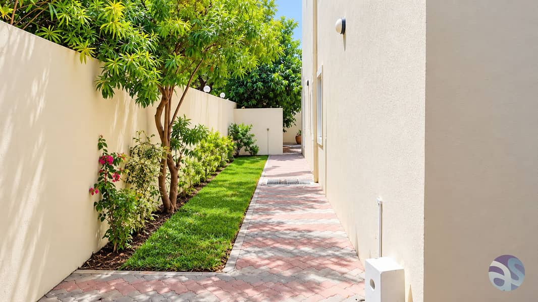 4 Sunlit Tropical Courtyard Walkway. png