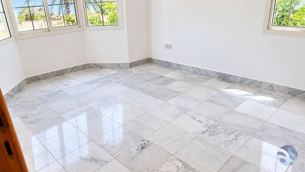 14 Bright Empty Bay Window Room. png