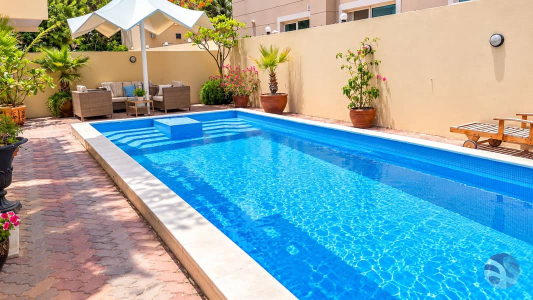 18 Sunlit Tropical Courtyard Pool. png