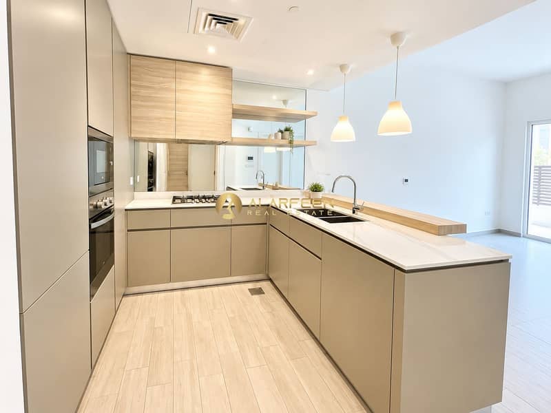 5 Bright Minimalist Kitchen with Wood Accents. png