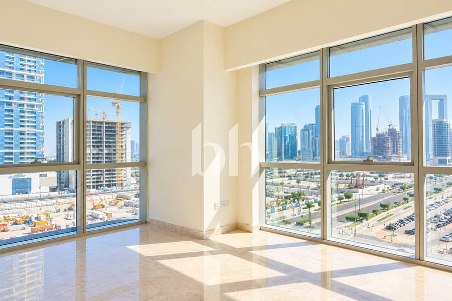 Sunlit Corner Room Overlookingthe City Sunlit Corner Room Overlookingthe City