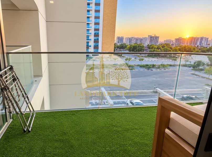 8 Sunset Balcony Overlooking the City. png