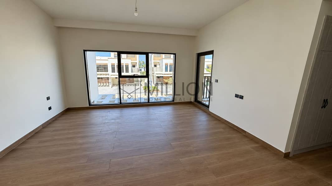 3 Empty Bedroom with Black-Framed Window-1. png