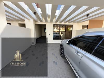 4 Bedroom Townhouse for Rent in DAMAC Lagoons, Dubai - Modern Carport Entrance with Silver SUV. png