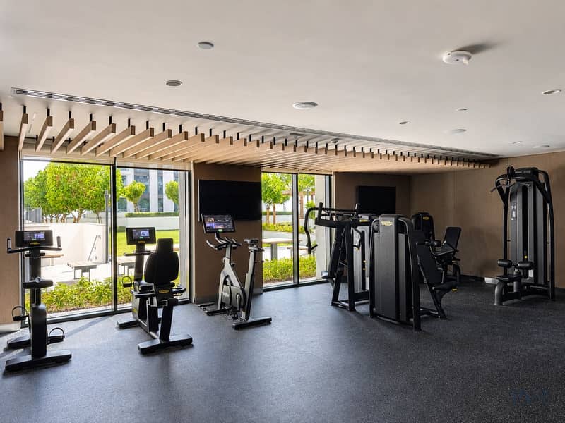 15 Modern Gym with Windows and Equipment. jpeg