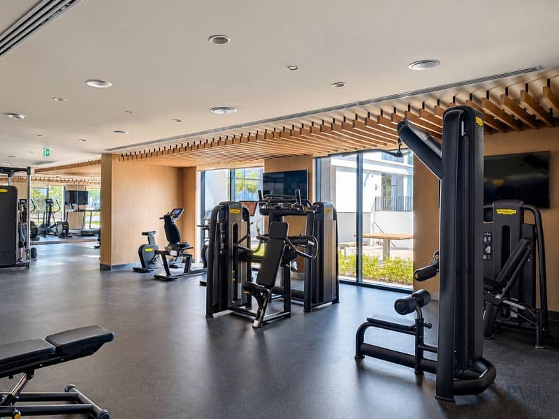 16 Bright Modern Technogym Fitness Center. jpeg