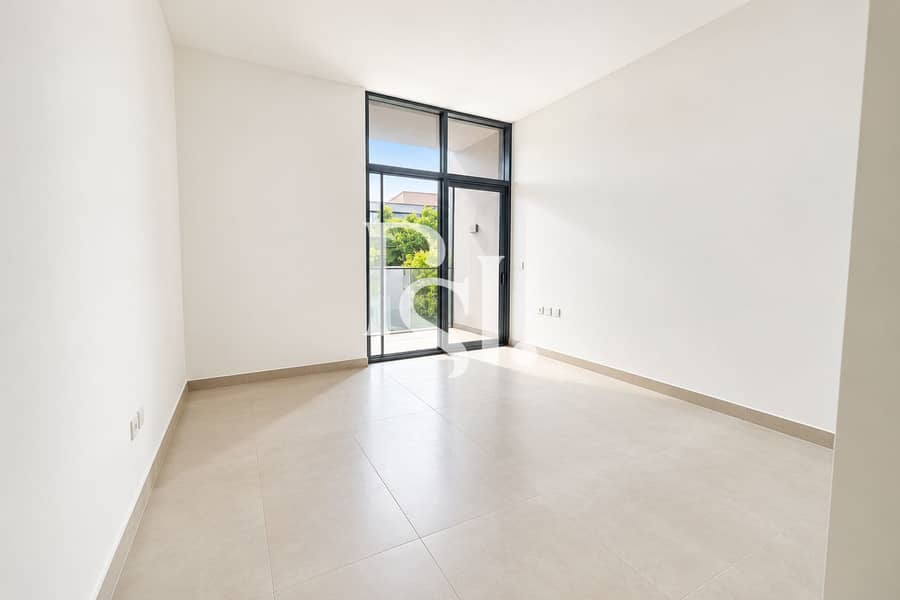 8 Sunlit Minimalist Room with Garden Views. png