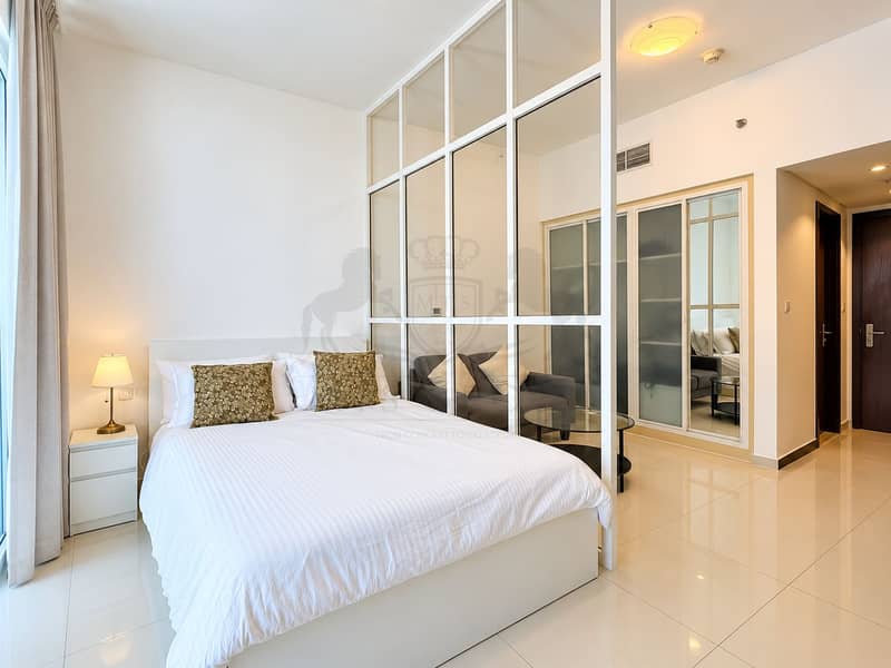 3 Modern Bedroom with Glass Partition and Warm Accents. png
