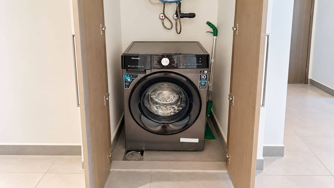 14 Open Laundry Closet with Hisense Washer. png