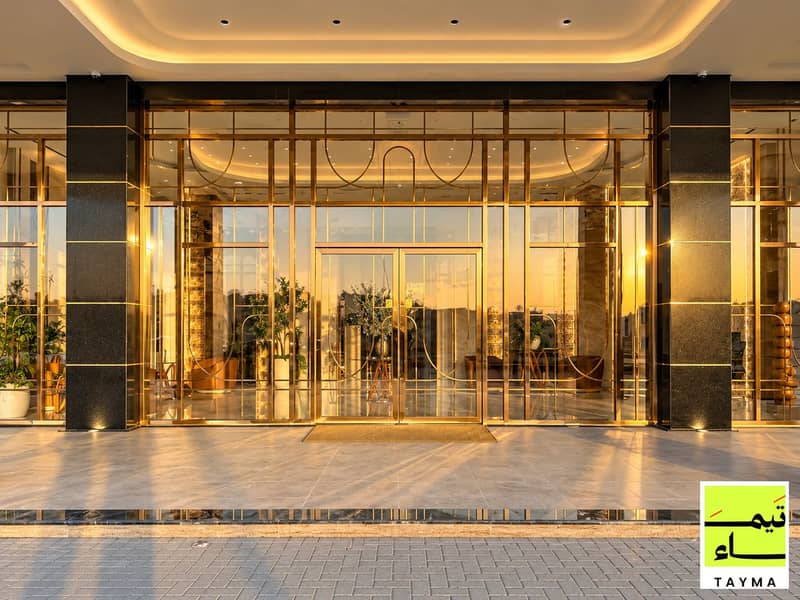 30 Al Tay Gate - Riqaibah, Sharjah - Building & Amenities - 02 - Main Entrance. png