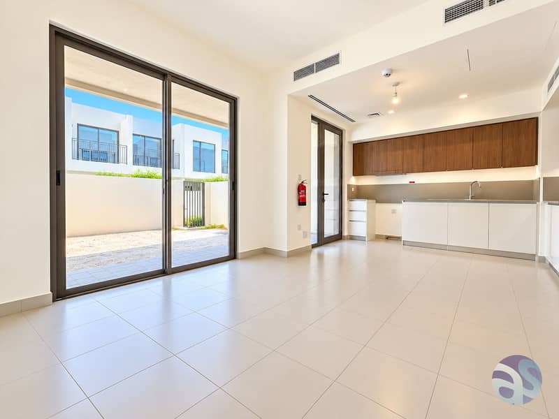3 Spacious Modern Living Kitchen with Patio Views. png