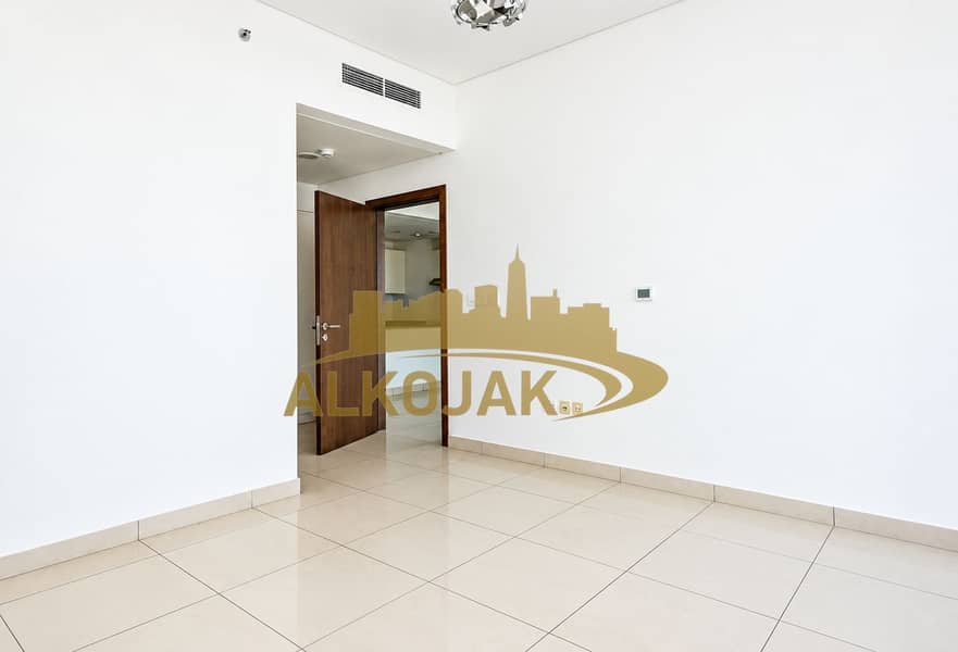 6 Bright Minimalist Room with Open Doorway. png