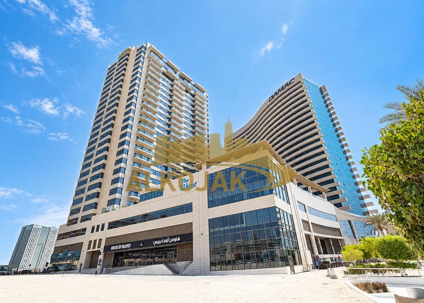 15 Modern Waterfront Towers Under Blue Skies. png