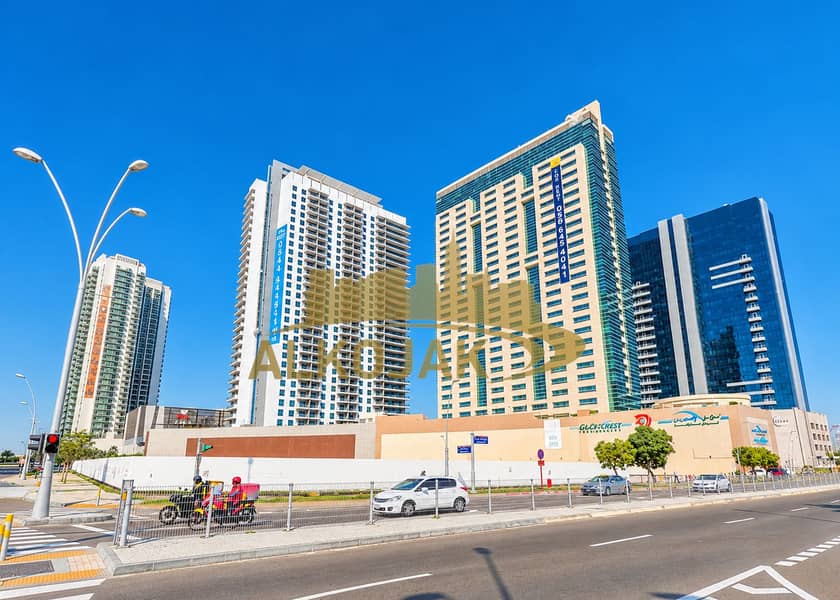 24 Sunny Dubai High-Rise District Streetscape. png