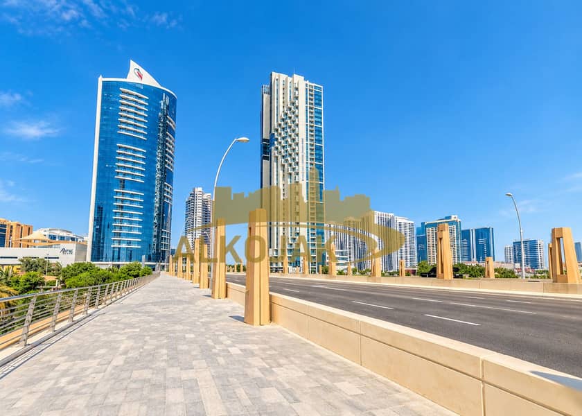 30 Waterfront Promenade and Modern Skyline. png