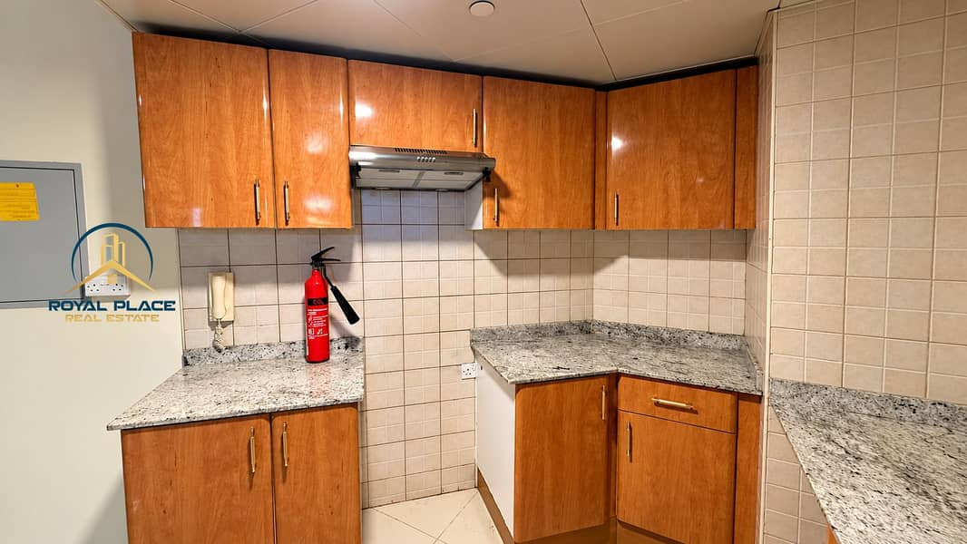 5 Warm Wood L-Shaped Kitchenette Corner. png
