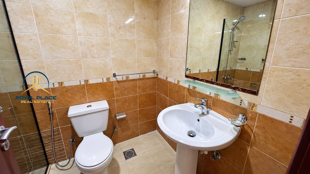 8 Modern Beige and Brown Bathroom. png