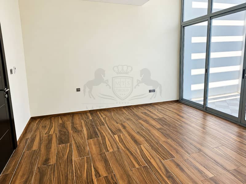 3 Sunlit Modern Room with Glass Doors. png