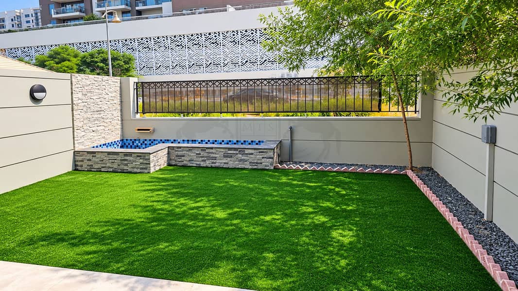5 Modern Courtyard with Mosaic Water Feature. png