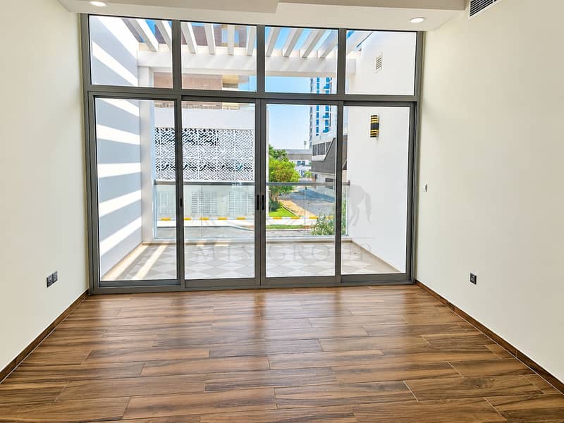 8 Bright Modern Room with Balcony Views. png