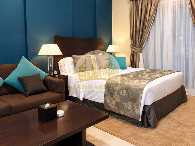 3 Elegant Teal and Taupe Hotel Bedroom. png
