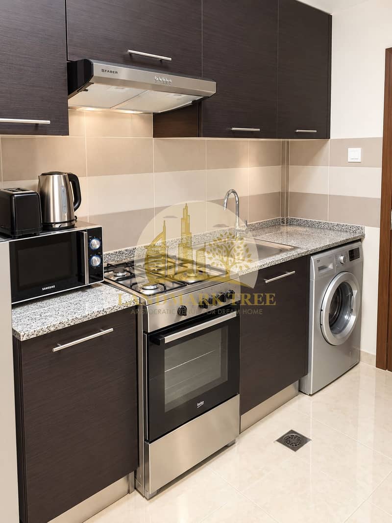 6 Modern Espresso Kitchen with Stainless Appliances. png