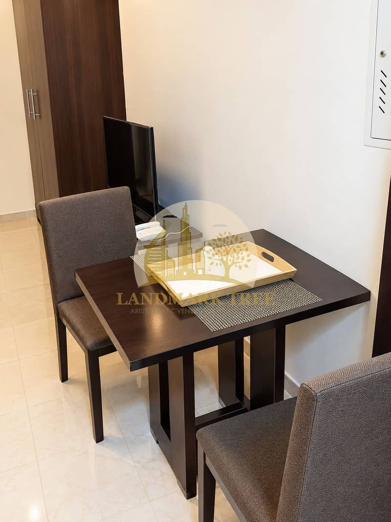 7 Modern Dining Corner with TV Setup. png