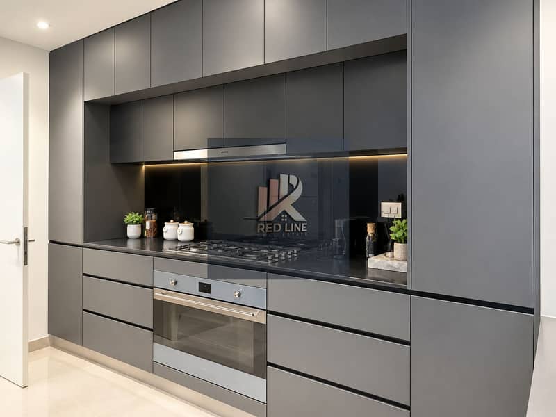 6 Sleek Modern Grey Kitchen with Black Glass Backsplash. png