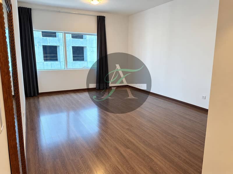 2 Empty Modern Room with Dark Wood Floors. png