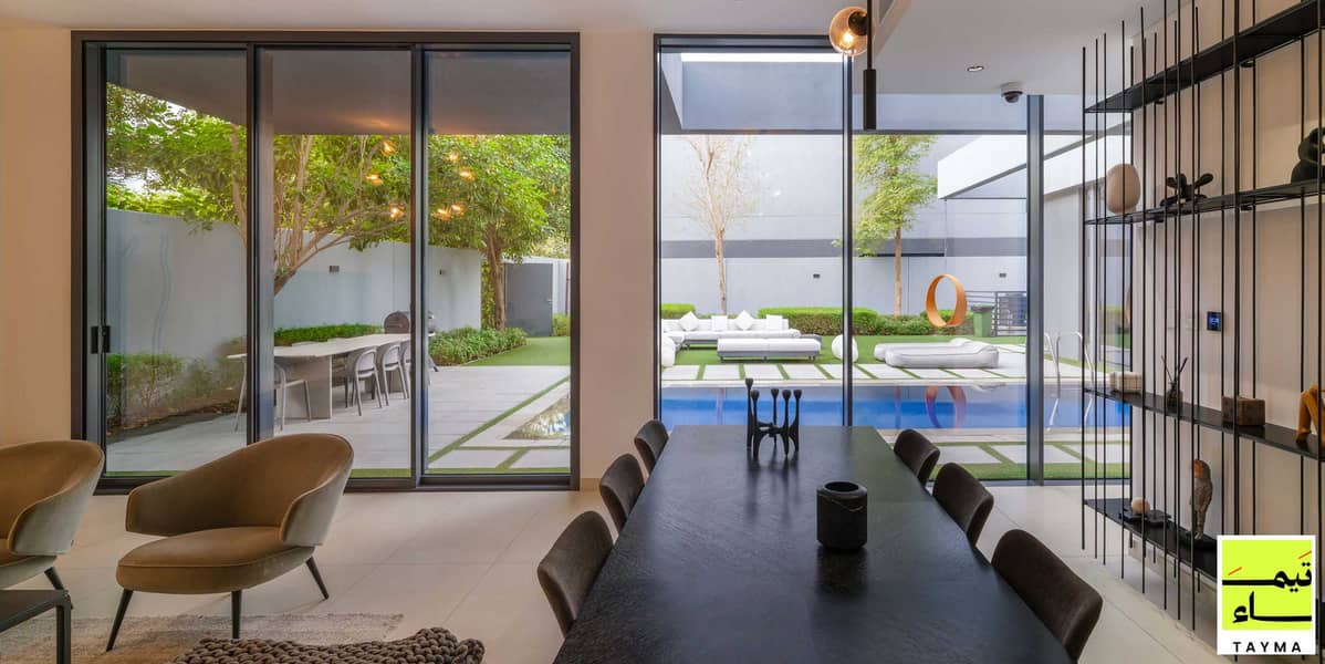 6 07 - Dalia Villa A - Living and Dining - Garden View. jpg