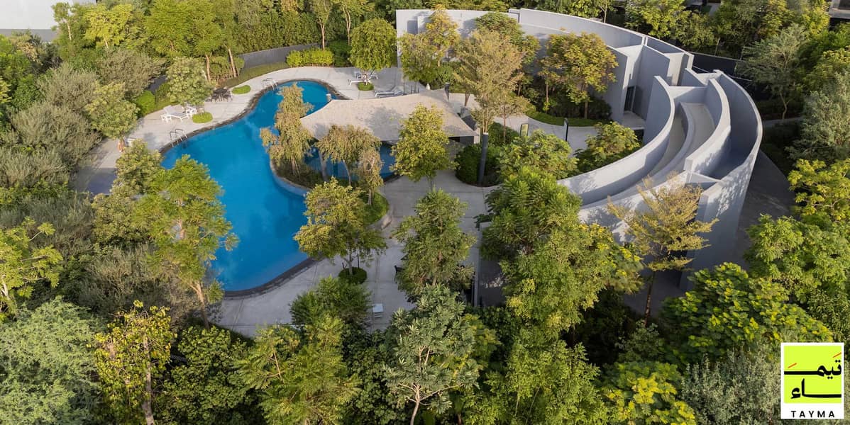 2 03 - Dalia Villa A - Swimming Pool and Lagoon Aerial. jpg