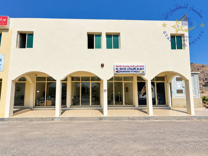 Cream-Stucco Equipment Rental Building. png Cream-Stucco Equipment Rental Building. png