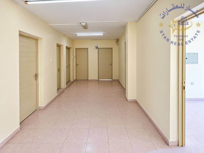 5 Clean Beige Corridor with Fluorescent Lighting. png