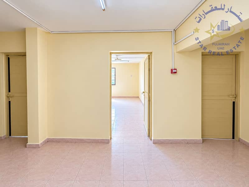 6 Symmetrical Cream-Tiled Hallway. png