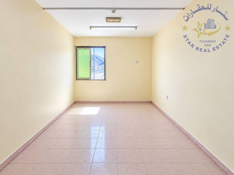 7 Bright Empty Room with Mountain View. png