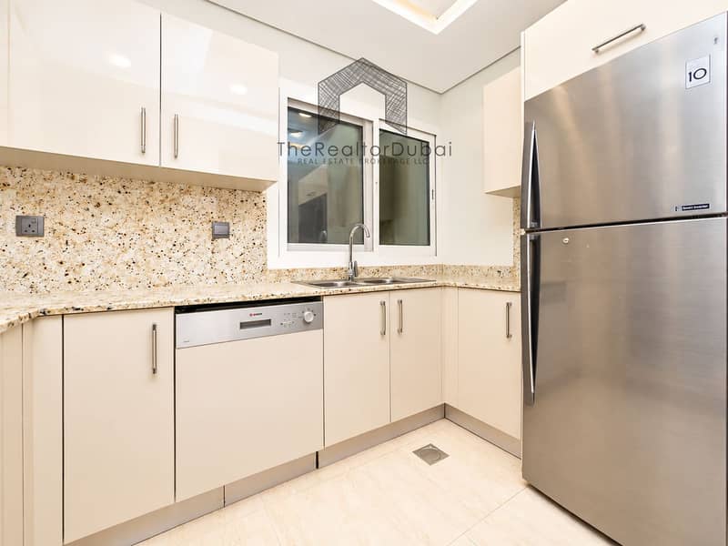 5 Bright Modern Kitchen with Stainless Appliances. png