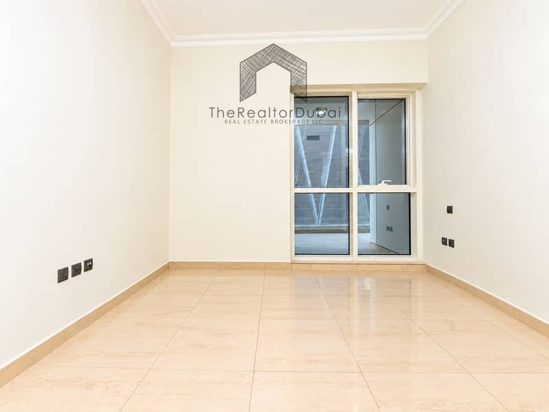 6 Minimalist Cream-Tiled Room with Window. png
