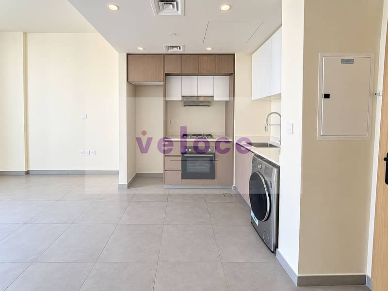 7 Modern Empty Open-Plan Kitchen Living Area. png