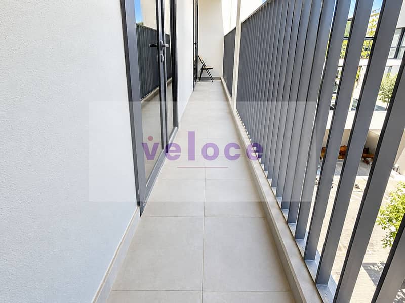 11 Modern Balcony Perspective with Folding Chair. png