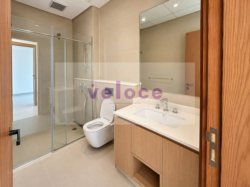 9 Modern Beige Tile Bathroom Interior. png