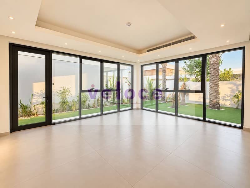 15 Sunlit Modern Living Room with Courtyard Views. png