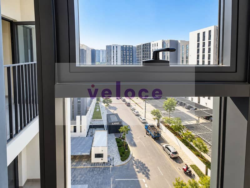 8 Modern Window View of Urban Residences. png
