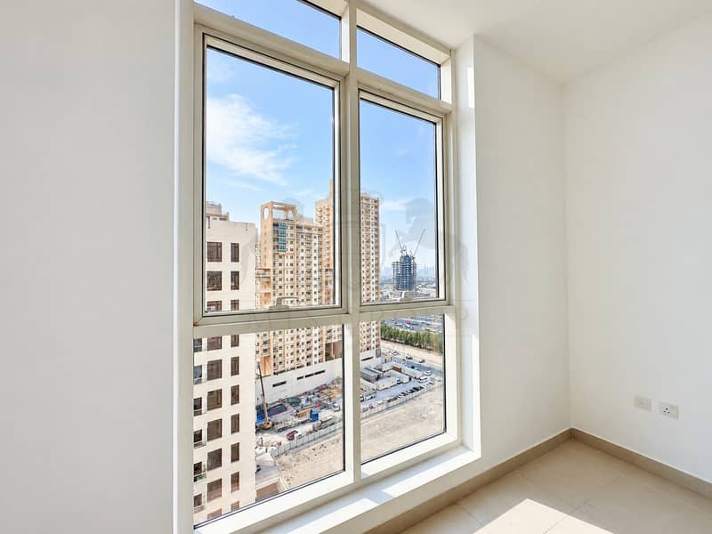 13 Bright Minimalist Room with City Views. png