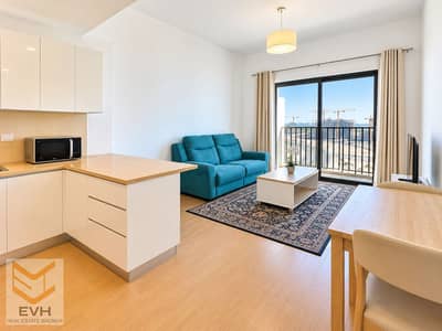1 Bedroom Flat for Rent in Wasl Gate, Dubai - Bright Modern Apartment with City Views. png