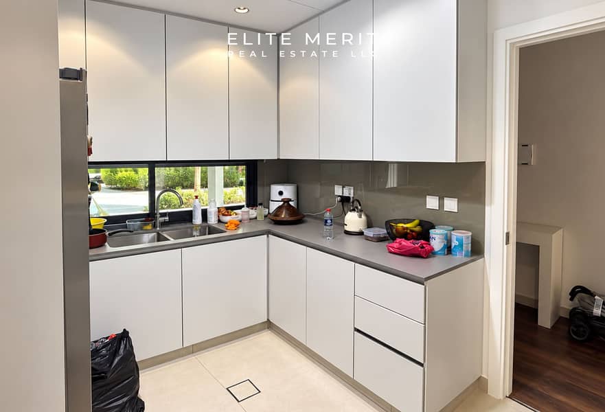 4 Bright Minimalist Kitchen with Stroller View. jpg