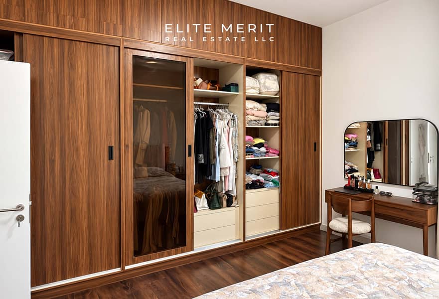 8 Warm Walnut Walk-In Wardrobe Bedroom. jpg