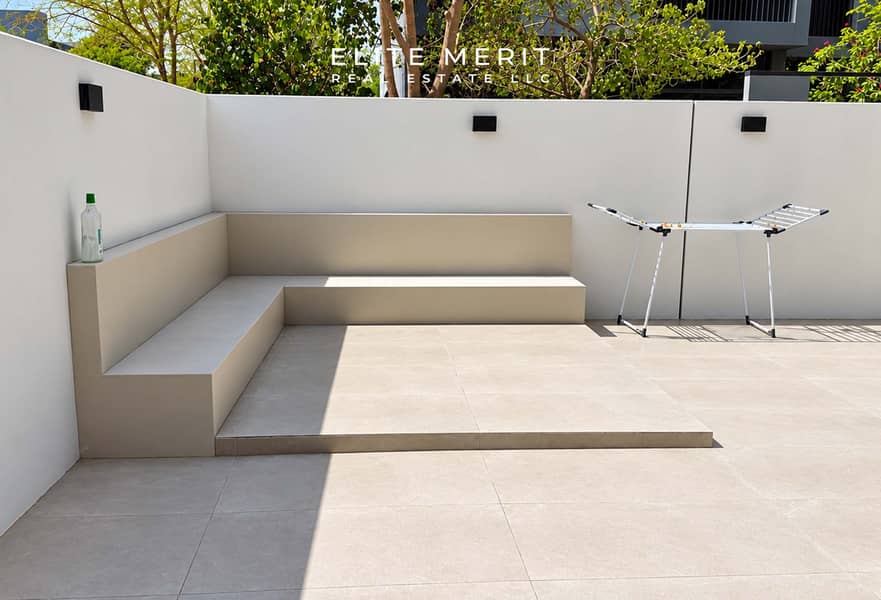 11 Sunlit Minimalist Patio with Drying Rack. jpg
